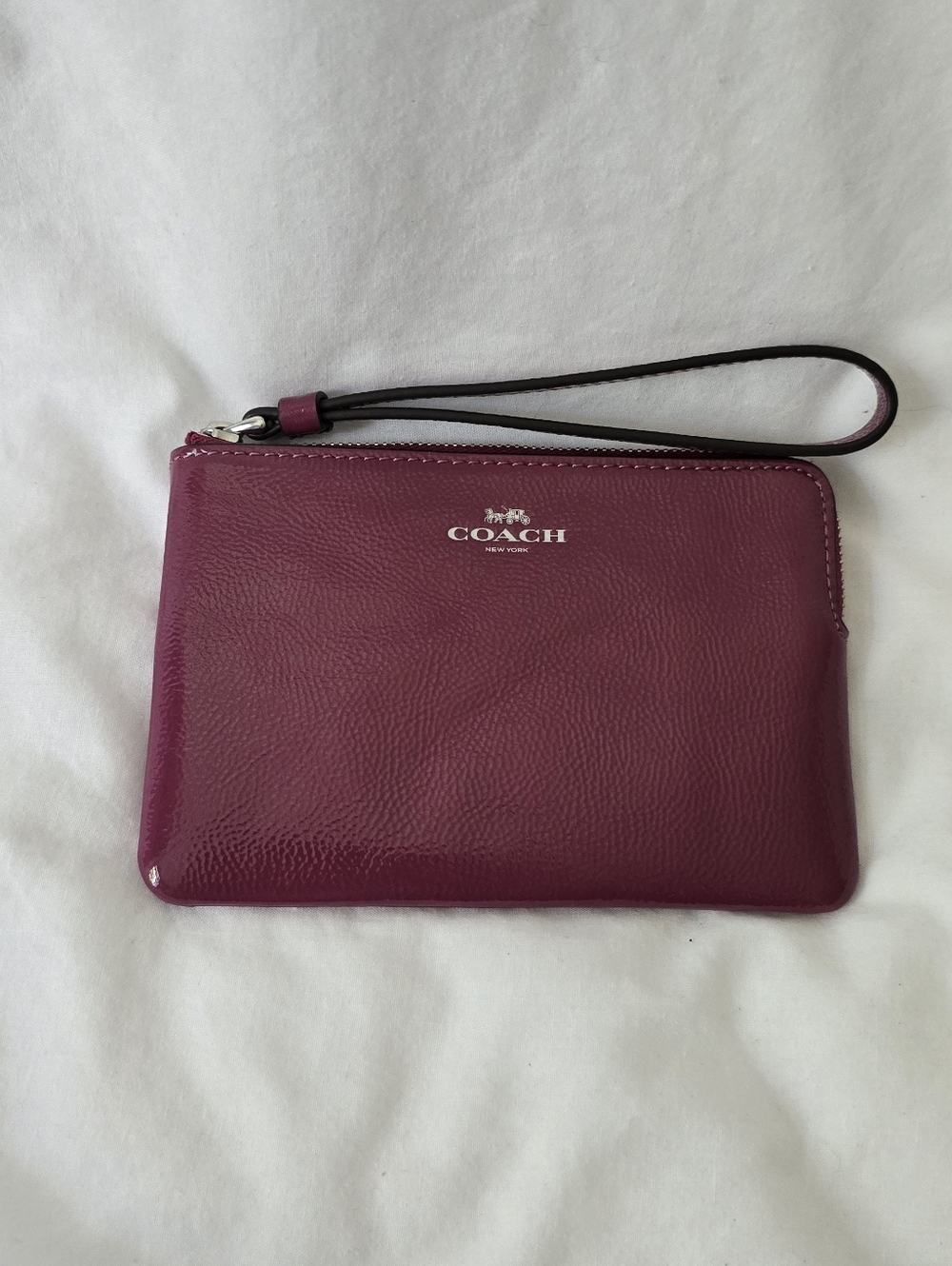 COACH Patent Leather Wristlet in Deep Berry